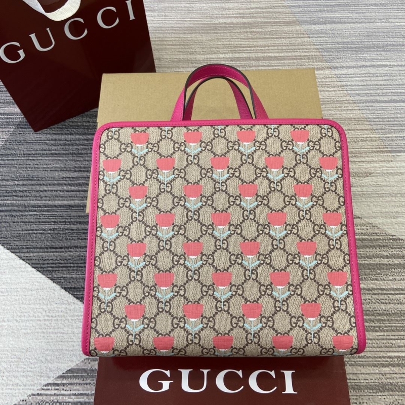 G*u*i shopping bags